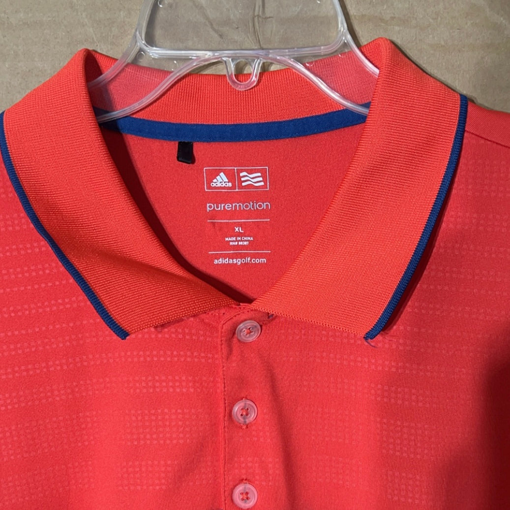 Adidas Puremotion men’s reddish orange polo shirt.